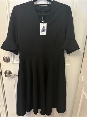 Black Flare Sleeve Dress with pockets by MOKAYEE SIZE L Large NWT